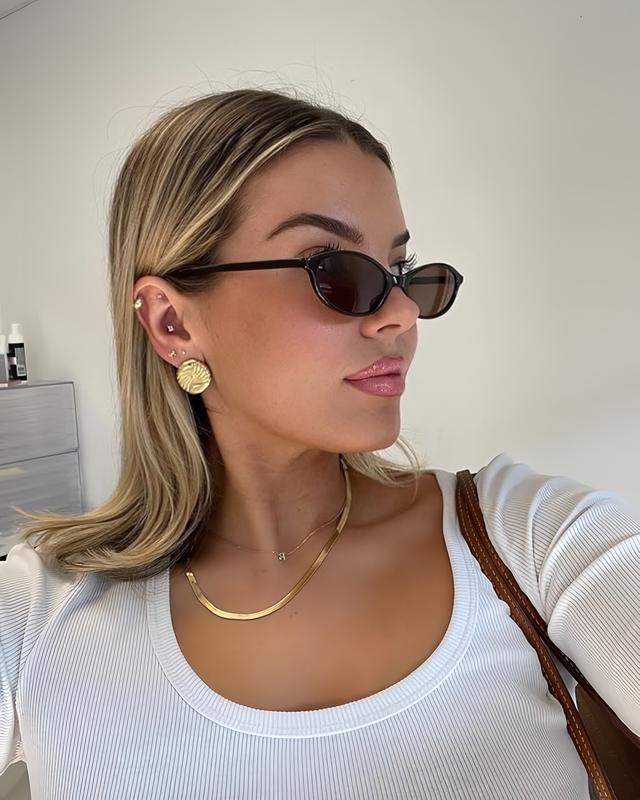 Ashley L.